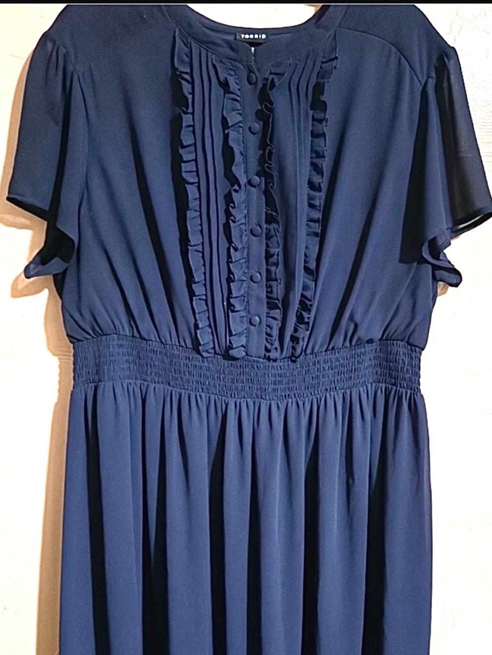 TORRID size 2 lined dress with embellished of buttons and ruffle. The excellent